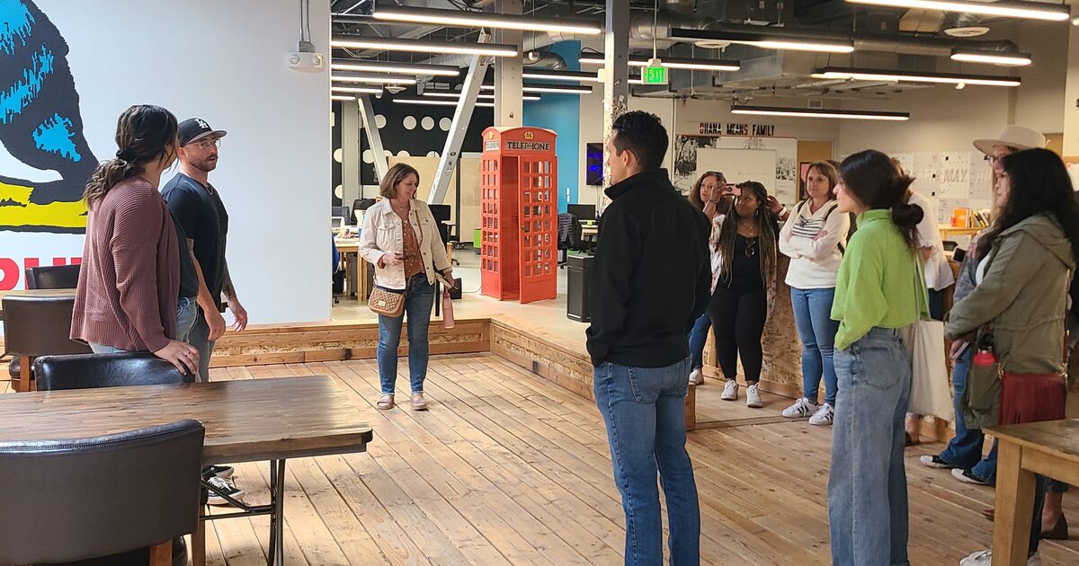 A ministry leader welcoming a group of new volunteers